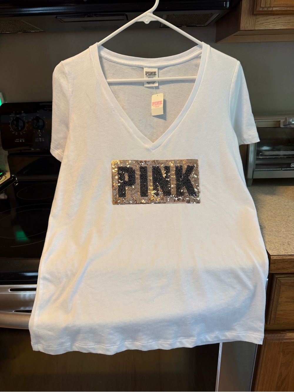 Victoria's Secret White V-Neck Tee with Gold & Black Sequin PINK Patch
